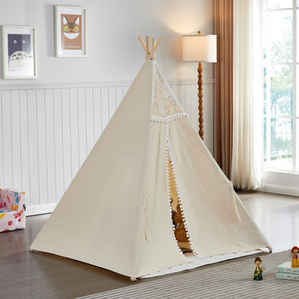 Beige children's teepee in a room with a lamp and window